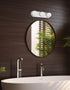 Round mirror on a wooden wall with a modern bathroom setup
